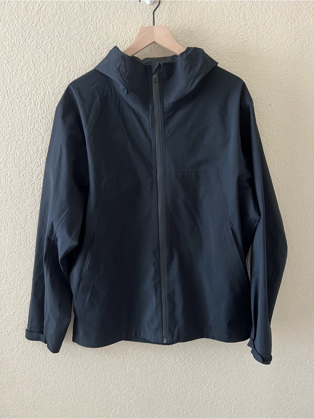 Uniqlo Men's Black Hooded Raincoat - Minimal Waterproof Jacket